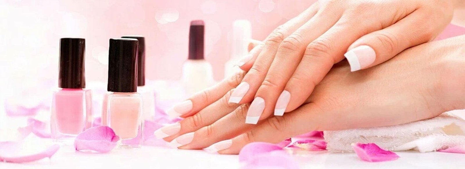 Soft pink manicure with petals